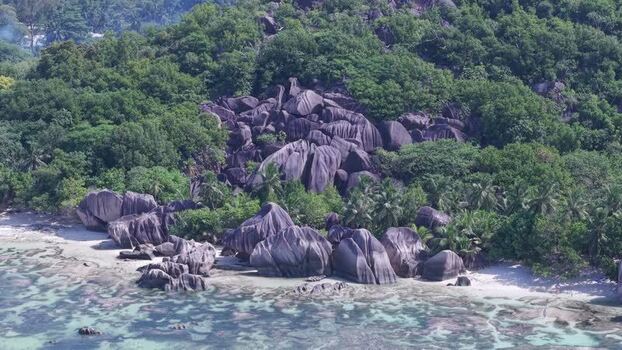 Aerial view of Anse Reunion granite boulders Seychelles.