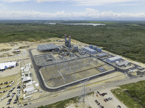 Aerial view of the Manzanillo Power Plant with industrial cooling towers electrical substation and surrounding infrastructure in Pepillo Salcedo Monte Cristi Province Dominican Republic. Aerial view of the Manzanillo Power Plant with industrial cooling towers electrical substation and surrounding infrastructure in Pepillo Salcedo Monte Cristi Province Dominican Republic.
