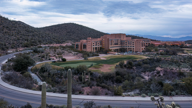 Tucson Arizona United States 05 May 2021 Aerial view of JW Marriott Tucson Starr Pass Resort Spa in the desert with saguaro cacti golf course and mountain backdrop. Tucson Arizona United States 05 May 2021 Aerial view of JW Marriott Tucson Starr Pass Resort Spa in the desert with saguaro cacti golf course and mountain backdrop.