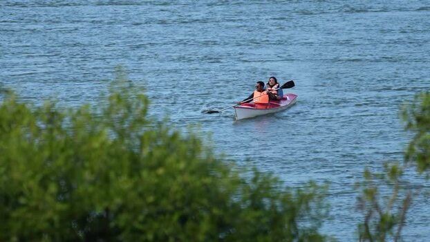 View of people kayaking on the water in Cox s Bazar Bangladesh.