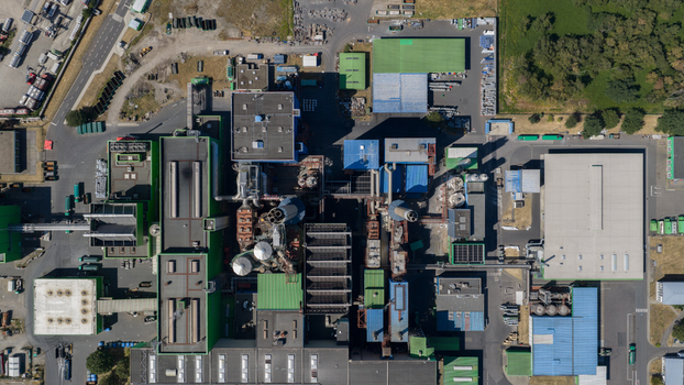 Aerial view of the Abfallkraftwerk Herten waste to energy plant with complex industrial piping chimneys and metal structures Herten Nordrhein Westfalen Germany.