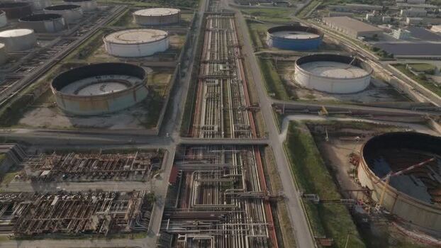 Aerial view of oil storage tanks and pipelines Italy. Aerial view of oil storage tanks and pipelines Italy.