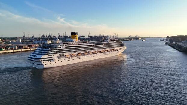 Aerial view of a cruise ship on the Elbe river in Hamburg Germany. Aerial view of a cruise ship on the Elbe river in Hamburg Germany.
