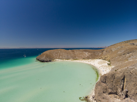 Aerial view of Balandra beach with turquoise water white sand and rocky hills in La Paz Baja California Sur Mexico. Aerial view of Balandra beach with turquoise water white sand and rocky hills in La Paz Baja California Sur Mexico.