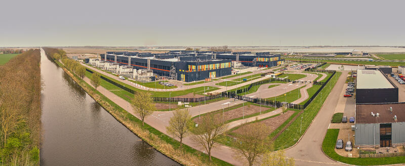 Middenmeer Netherlands 14 May 2026 Aerial view of Microsoft Datacenter Campus AMS 13 and 14 with its modern dark facades adjacent canal and surrounding flat landscape. Middenmeer Netherlands 14 May 2026 Aerial view of Microsoft Datacenter Campus AMS 13 and 14 with its modern dark facades adjacent canal and surrounding flat landscape.