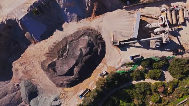 Aerial view of a stone quarry and asphalt plant in Spain. Aerial view of a stone quarry and asphalt plant in Spain.