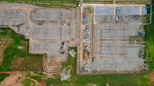 Aerial view of TCN SubStation Katampe featuring electrical transformers power lines and grid infrastructure in a fenced industrial area in Abuja Federal Capital Territory Nigeria.