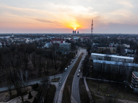 Aerial view of Uzvaras Park and the surrounding urban landscape of Pardaugava during a golden sunset in Riga Latvia. Aerial view of Uzvaras Park and the surrounding urban landscape of Pardaugava during a golden sunset in Riga Latvia.