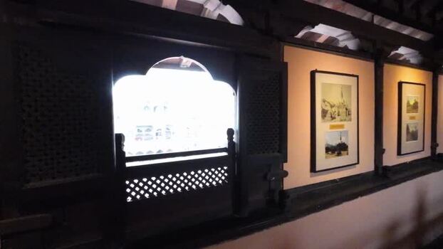 View of a historic interior with carved wooden windows Nepal.
