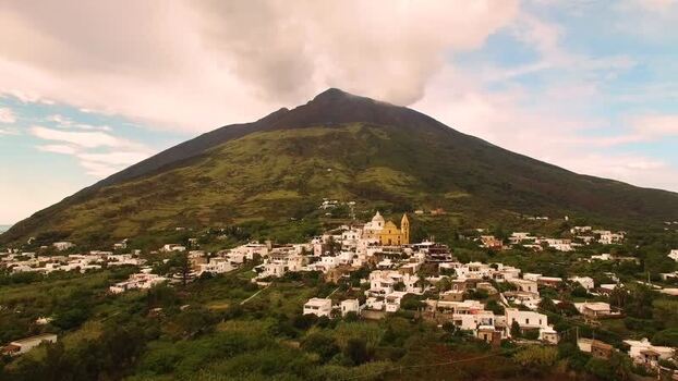 Aerial view of Stromboli volcano and village Italy.