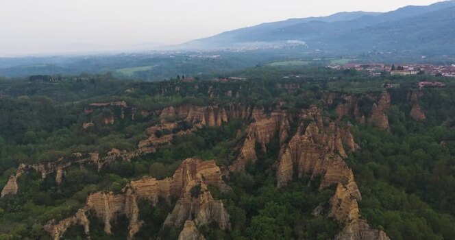 Aerial view of the Balze del Valdarno rock formations and forests Italy. Aerial view of the Balze del Valdarno rock formations and forests Italy.