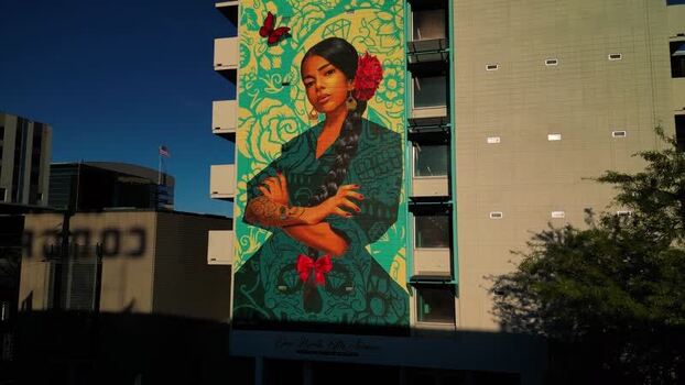 Aerial view of mural of woman on building United States. Aerial view of mural of woman on building United States.