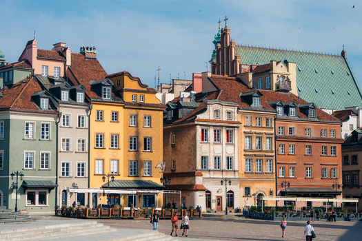 View of the historic colorful buildings and cobblestone square in Warsaw Old Town Warsaw Masovian Voivodeship Poland. View of the historic colorful buildings and cobblestone square in Warsaw Old Town Warsaw Masovian Voivodeship Poland.