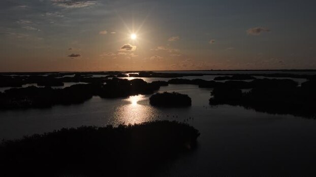 Aerial view of Yucalpeten lagoon at sunset in Mexico. Aerial view of Yucalpeten lagoon at sunset in Mexico.