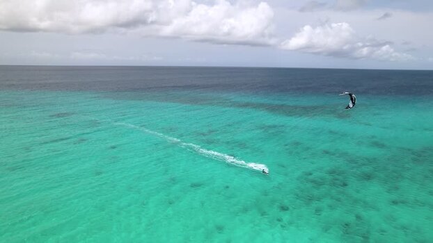 Aerial view of kitesurfer in Los Roques archipelago Venezuela.