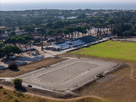 Cascais Lisboa Portugal 19 July 2026 Aerial view of Centro Hipico Quinta da Marinha with its equestrian arenas surrounding pine trees and grassy fields. Cascais Lisboa Portugal 19 July 2026 Aerial view of Centro Hipico Quinta da Marinha with its equestrian arenas surrounding pine trees and grassy fields.