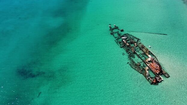 Aerial view of the Shipwreck Epanomi in turquoise waters Greece.