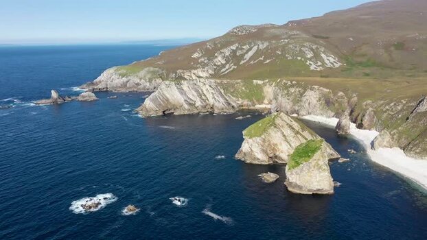 Aerial view of Glenlough Bay cliffs in Ireland.