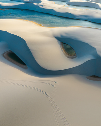 Aerial view of the white sand dunes and turquoise lagoons of Parque Nacional dos Lencois Maranhenses Lencois Maranhenses MA Brazil. Aerial view of the white sand dunes and turquoise lagoons of Parque Nacional dos Lencois Maranhenses Lencois Maranhenses MA Brazil.