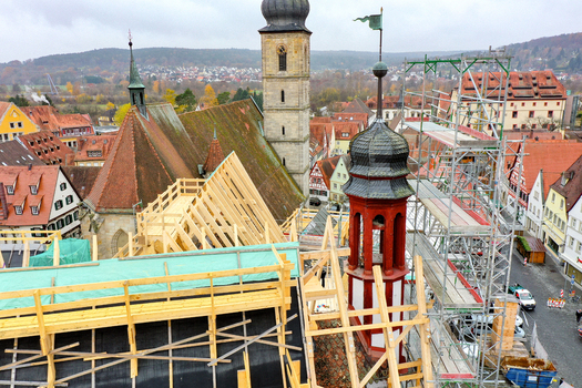 Aerial view of Rathaus Forchheim under renovation with scaffolding and wooden roof structures overlooking the historic old town Forchheim Bayern Germany. Aerial view of Rathaus Forchheim under renovation with scaffolding and wooden roof structures overlooking the historic old town Forchheim Bayern Germany.