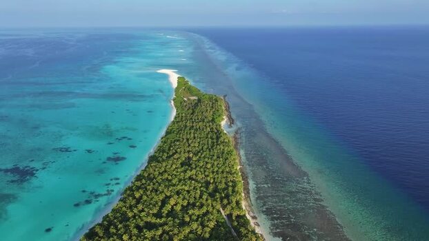 Aerial view of the tropical island of Fulhadhoo Maldives. Aerial view of the tropical island of Fulhadhoo Maldives.