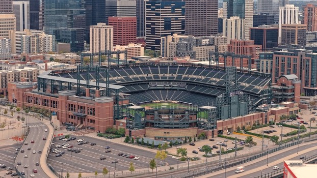 Denver United States 29 September 2026 Aerial view of Coors Field the home stadium of the Colorado Rockies surrounded by the dense urban skyline parking lots and city streets. Denver United States 29 September 2026 Aerial view of Coors Field the home stadium of the Colorado Rockies surrounded by the dense urban skyline parking lots and city streets.