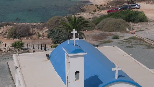 Aerial view of a small chapel by the sea in Northern Cyprus.