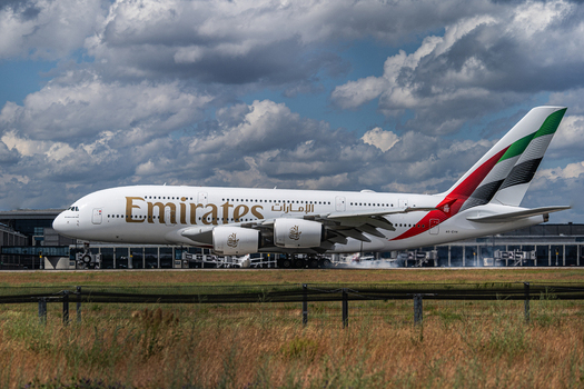 Berlin Germany 09 June 2026 View of an Emirates Airbus A380 landing at the Berlin Airport during the Internationale Luft und Raumfahrtausstellung with a cloudy sky in the background.