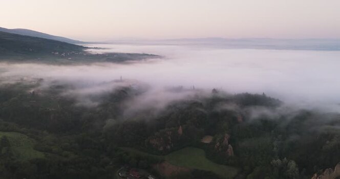 Aerial view of Balze del Valdarno shrouded in thick morning mist Italy. Aerial view of Balze del Valdarno shrouded in thick morning mist Italy.