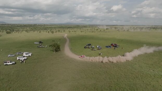 Aerial view of a rally car racing at Swara Plains Conservancy Kenya. Aerial view of a rally car racing at Swara Plains Conservancy Kenya.