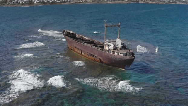 Aerial view of the Edro III shipwreck stranded on the rocky coast of the Mediterranean Sea in Cyprus Cyprus Cyprus. Aerial view of the Edro III shipwreck stranded on the rocky coast of the Mediterranean Sea in Cyprus Cyprus Cyprus.