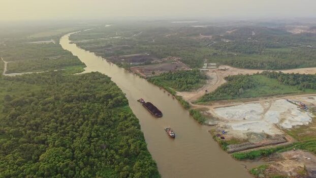Aerial view of Delta Mahakam coal barge in Anggana Indonesia.