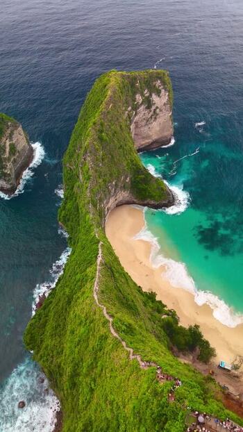 Aerial view of Kelingking Beach and the iconic T Rex cliff Indonesia. Aerial view of Kelingking Beach and the iconic T Rex cliff Indonesia.