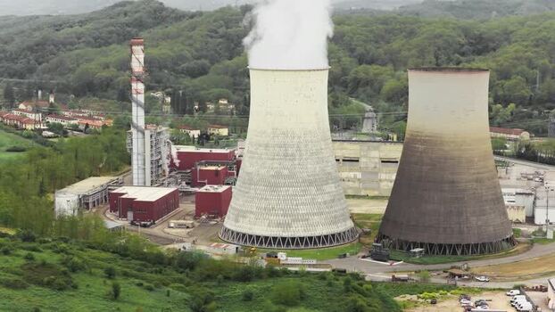 Aerial view of the Santa Barbara power plant and cooling towers Italy.