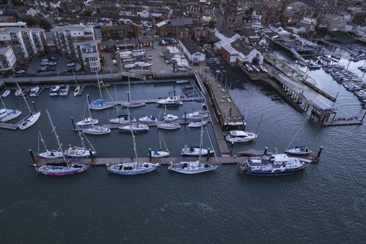 Aerial view of sailboats and yachts docked in the harbour at Cowes England United Kingdom.