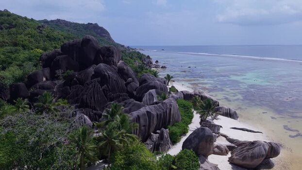 Aerial view of Anse Reunion beach with granite boulders Seychelles.