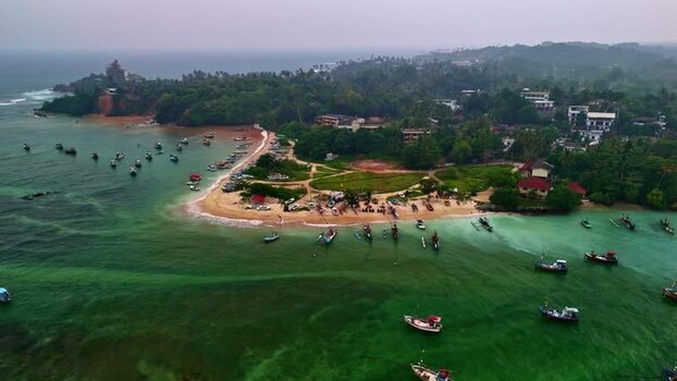 Aerial view of fishing boats in a coastal bay Sri Lanka.