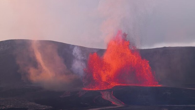 View of a fiery volcanic eruption with molten lava United States.