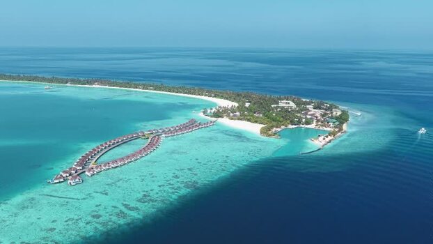 Aerial view of luxury overwater bungalows and lagoons Maldives. Aerial view of luxury overwater bungalows and lagoons Maldives.