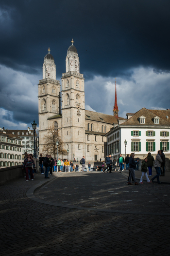 Zurich Switzerland 02 April 2023 View of the majestic Grossmünster church under a dramatic brooding sky its twin towers a beacon against the gathering storm. Zurich Switzerland 02 April 2023 View of the majestic Grossmünster church under a dramatic brooding sky its twin towers a beacon against the gathering storm.