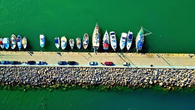 Aerial view of boats docked at a pier in Crete Greece.