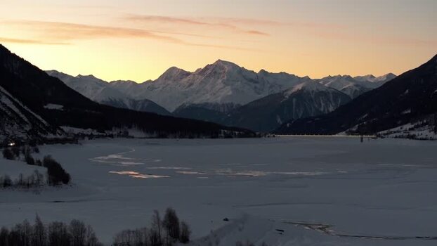 Aerial view of Reschensee at sunset in Italy. Aerial view of Reschensee at sunset in Italy.