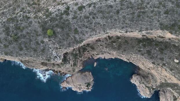 Aerial view of coastal cliffs in Moraira Spain.
