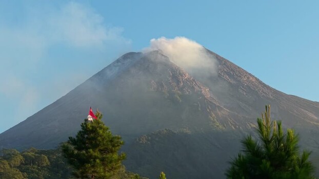 Aerial view of Mount Merapi volcano with smoke Indonesia.