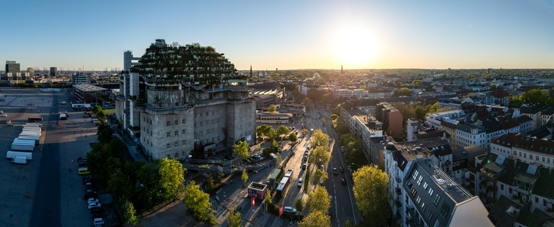 Hamburg Germany 01 May 2026 Aerial view of the St. Pauli Bunker with its lush green rooftop garden overlooking the Heiligengeistfeld and the city skyline during a clear sunset. Hamburg Germany 01 May 2026 Aerial view of the St. Pauli Bunker with its lush green rooftop garden overlooking the Heiligengeistfeld and the city skyline during a clear sunset.