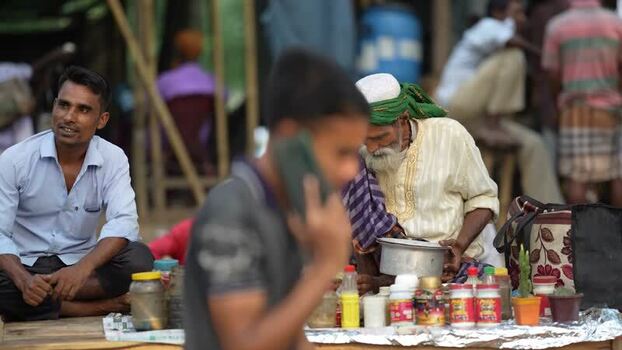 View of people at a street market in Mahasthan Bangladesh.