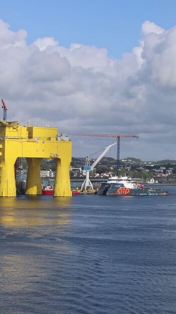 Aerial view of a yellow offshore platform in Haugesund Norway.