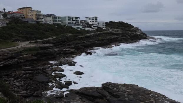 View of Bondi Beach coastline with crashing waves Australia.
