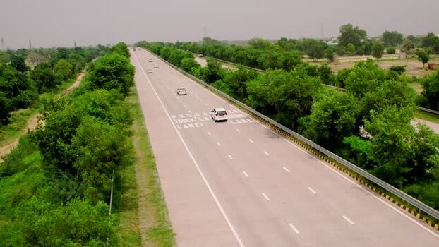 Aerial view of highway with cars in Agra India. Aerial view of highway with cars in Agra India.