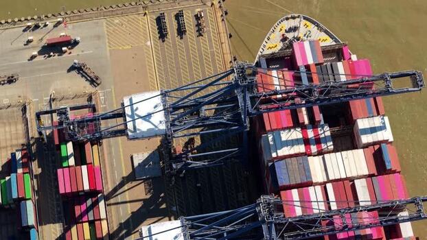 Aerial view of cargo ship at Port of Felixstowe United Kingdom.